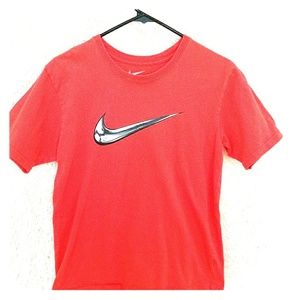 Boy's large orange Nike shirt
